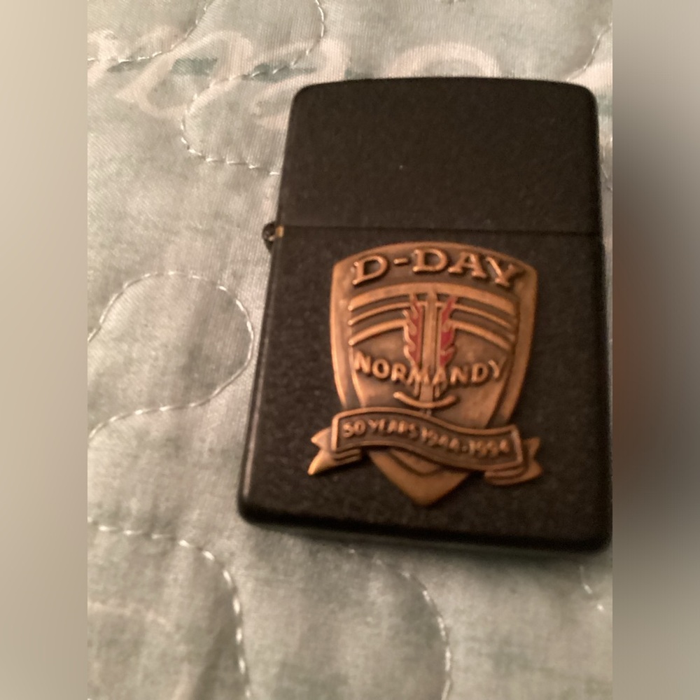 Zippo D-Day 1944-1994 crackle finished lighter.